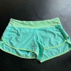 Lululemon Run Speed Short, 2.5” inseam, teal color with green accents, size 8